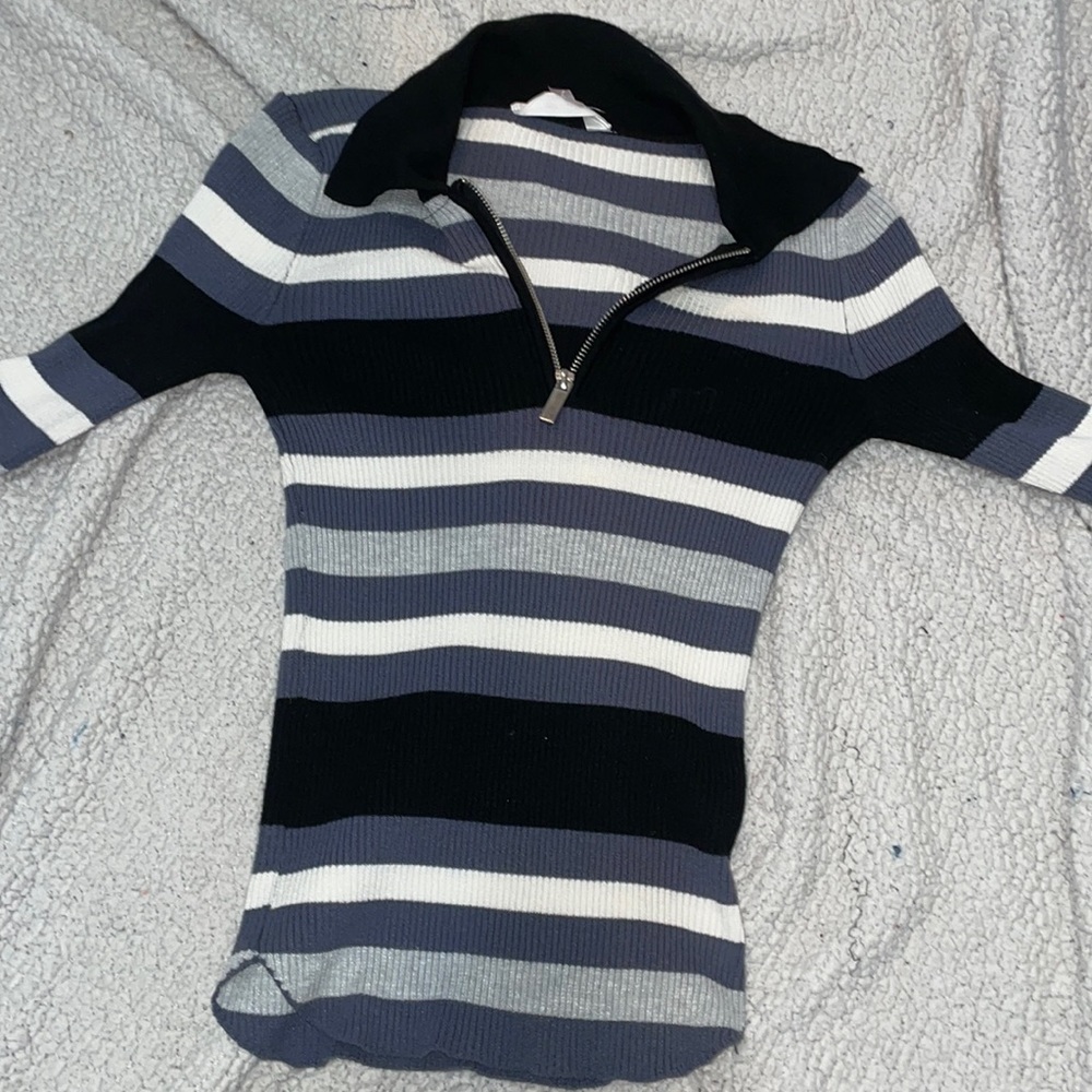 V Zip Up blue, white, and black shirt